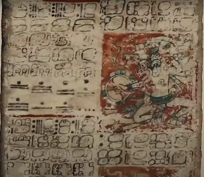 Página del Códice de Dresde con escritura jeroglífica y una figura humana
